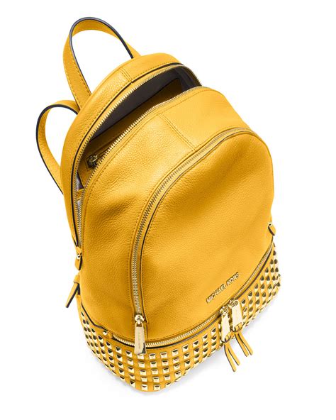 yellow michael kors backpack.